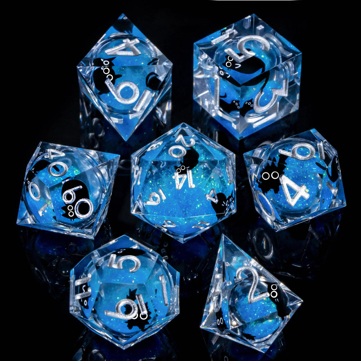 A set of six blue liquid core resin dice shaped like pyramids and dodecahedrons displayed on a reflective surface.