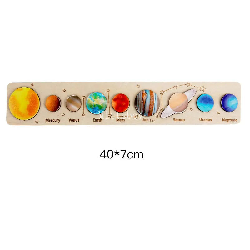 A wooden puzzle board showing the solar system planets, including Mercury, Venus, Earth, Mars, Jupiter, Saturn, Uranus, and N