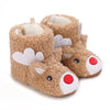 Pair of adorable animal-themed baby first walker shoes made of brown faux fur with white and red accents