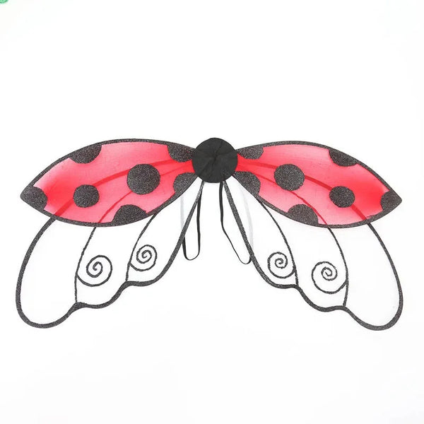 A pair of red ladybug wings with black polka dots and a black center for a costume.