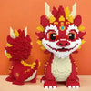 A red dragon figure and a small red bear figure made from micro building blocks.