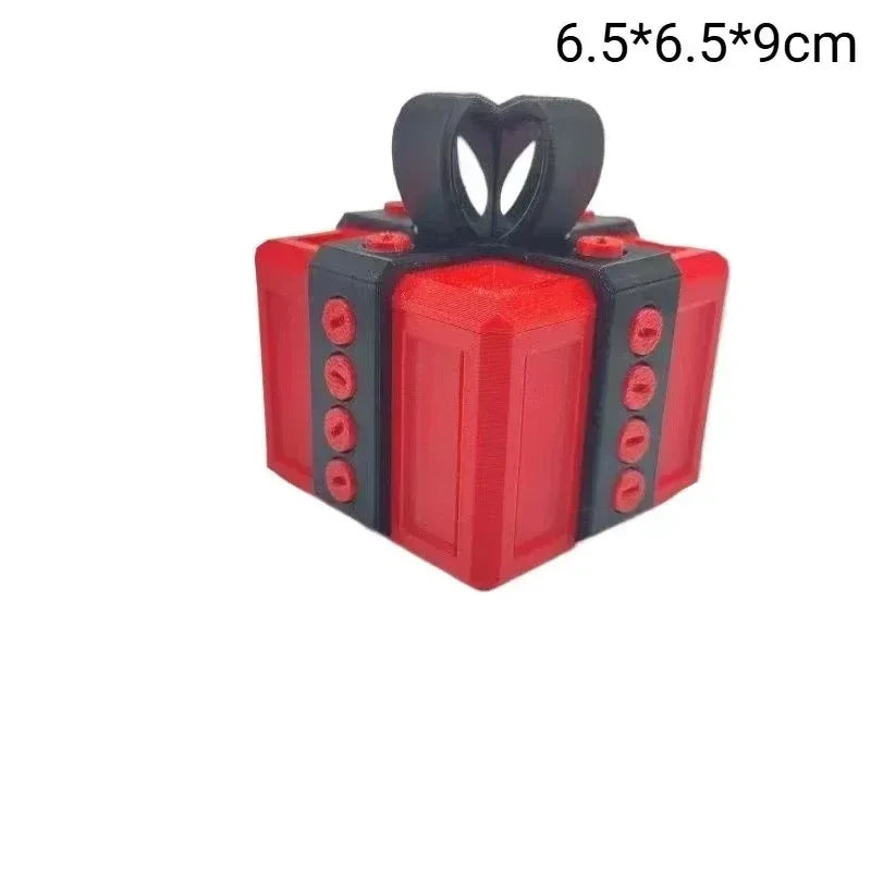 A red and black pop-up gift box with a bow, measuring 6.5x6.5x9cm.