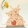 A wooden puzzle depicting a family of elk with names, including William, Emma, Ava, and Olivia.
