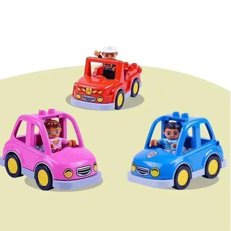 A set of city traffic vehicle building blocks featuring a red truck and a blue car with minifigure drivers.