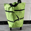 A lime green foldable shopping bag with black straps, resting on a wheeled cart.