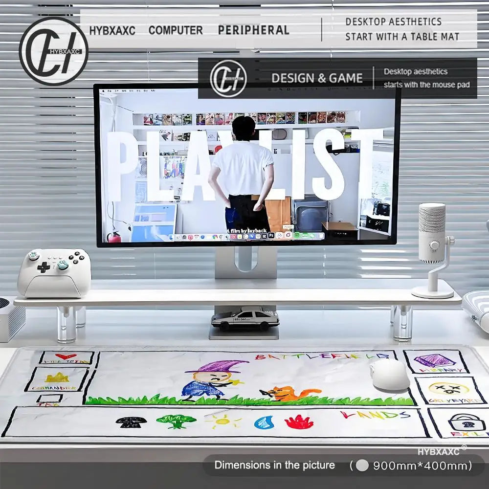 A large gaming mouse pad with stitched edges is displayed on a desk next to a computer monitor.