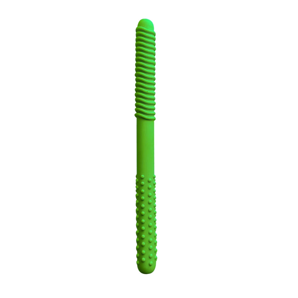 A bright green silicone chewing tube with a ribbed top and a textured, dotted bottom.