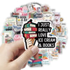 A hand holds a sticker featuring an ice cream cone made of stacked books and the text I just really love ice cream & books