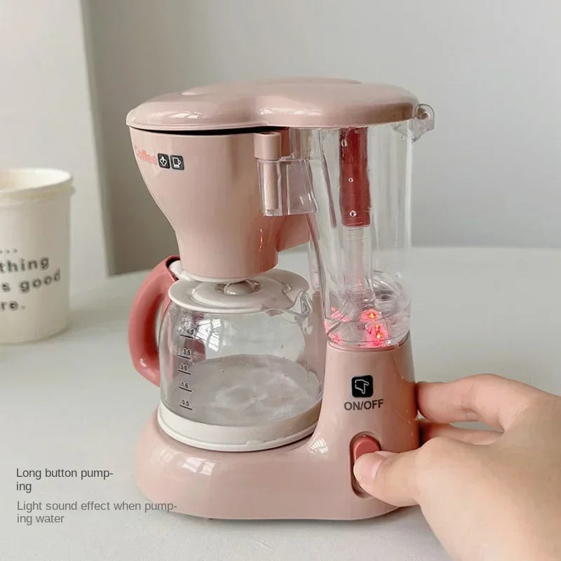 A pink electric coffee maker and water dispenser is shown on a white surface.