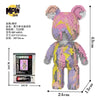 A colorful bear-shaped micro building block kit with purple and pink pieces.