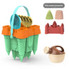 A green castle sand play set with a bucket, scoop, and three random accessories.