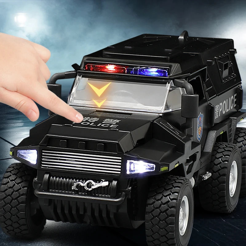 A black SWAT City Police truck diecast toy with lights and sounds being held by a hand.