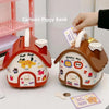 An orange house-shaped piggy bank with a lock and key is shown next to a 100 dollar coin.
