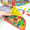 A hand holds a yellow double-sided magnetic tabletop game set with colorful components and a board.
