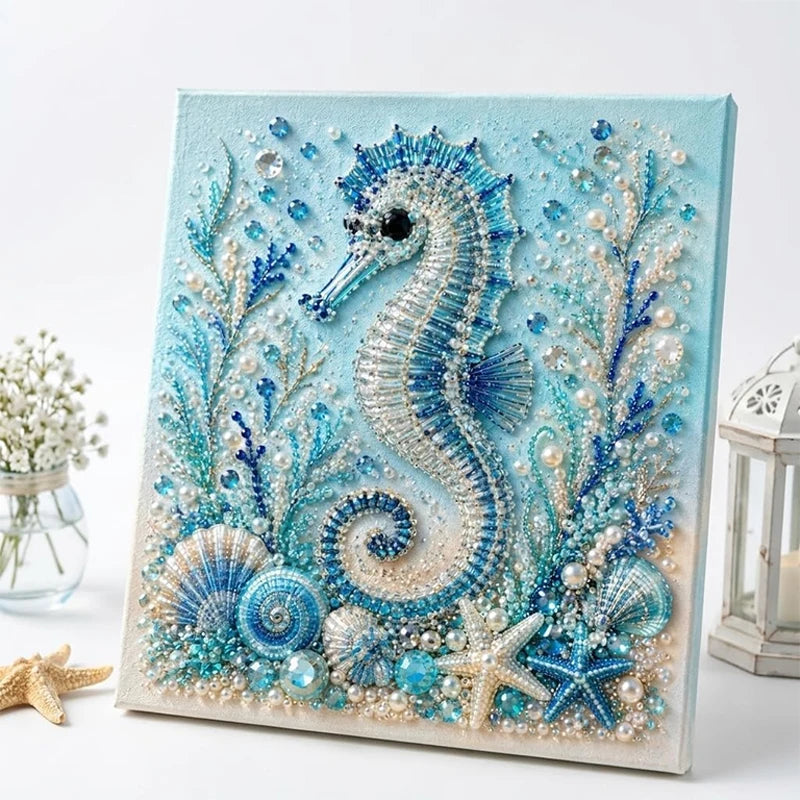 Diamond art kit featuring a shimmering blue and white sea creature design on a light blue background