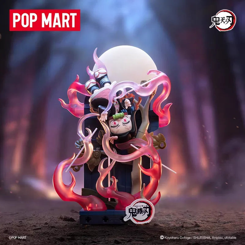A collectible blind box figure of a Demon Slayer character with pink flames and a large white sphere.