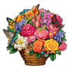 A vibrant bouquet of flowers, butterflies, and a bird is arranged in a wooden basket for a puzzle set.