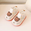 Paire de sandales d'été blanches antidérapantes pour bébés avec motif ours qui crache