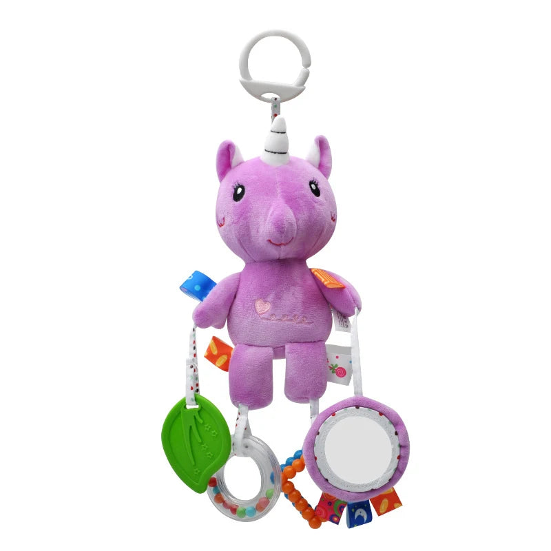 A purple unicorn plush toy with a silver hanger and attached rattle components.