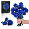 A hand holds a bouquet of realistic blue roses, which are packaged in a box labeled SupreOvis.