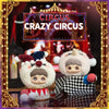 A plush blind box featuring a cute white animal character with large eyes and pink accents, displayed in a circus theme.