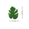 Green artificial tropical palm and monstera leaves with dimensions of 15 cm by 11 cm