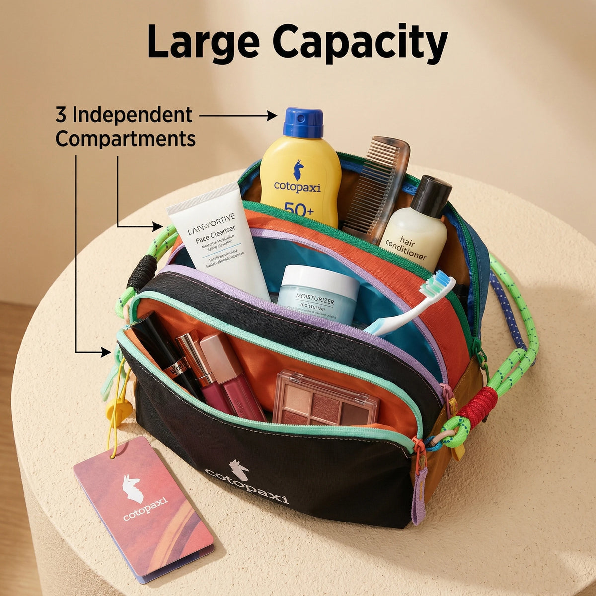 A brown storage bag with three independent compartments holds hair products and a yellow bottle.
