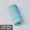 A spool of light blue 3mm cotton macrame cord measuring 100 meters for DIY crafts.