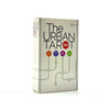A box of The Urban Tarot card deck with a white background and line art symbols.