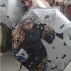 A white umbrella featuring a Demon Slayer character design on the fabric.