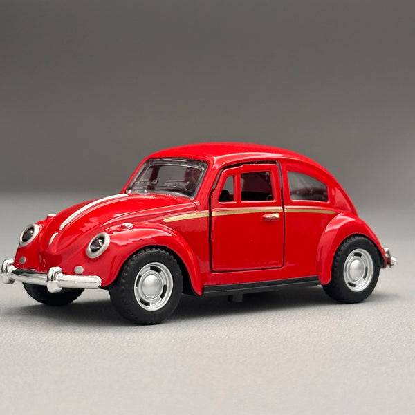 A red classic retro Beetle diecast model car with chrome accents and a black tire on a gray background.