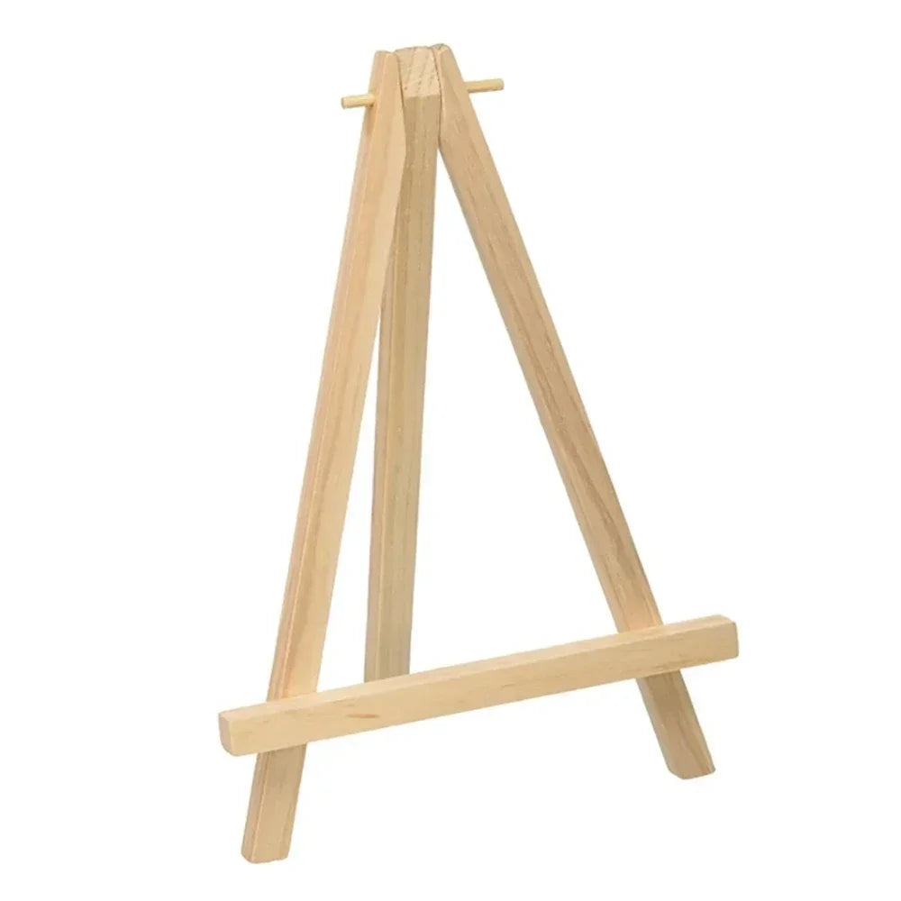 A light wooden mini easel with an adjustable frame for holding art projects.