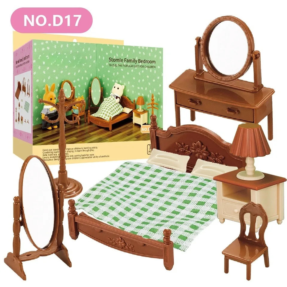 A miniature dollhouse furniture set featuring a wooden bed, dresser, mirror, and chair in brown tones.