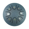 A round, dark gray steel tongue drum with numbered holes and mallets.