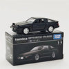A black Tomica Mitsubishi Starion die-cast model car in its packaging box.