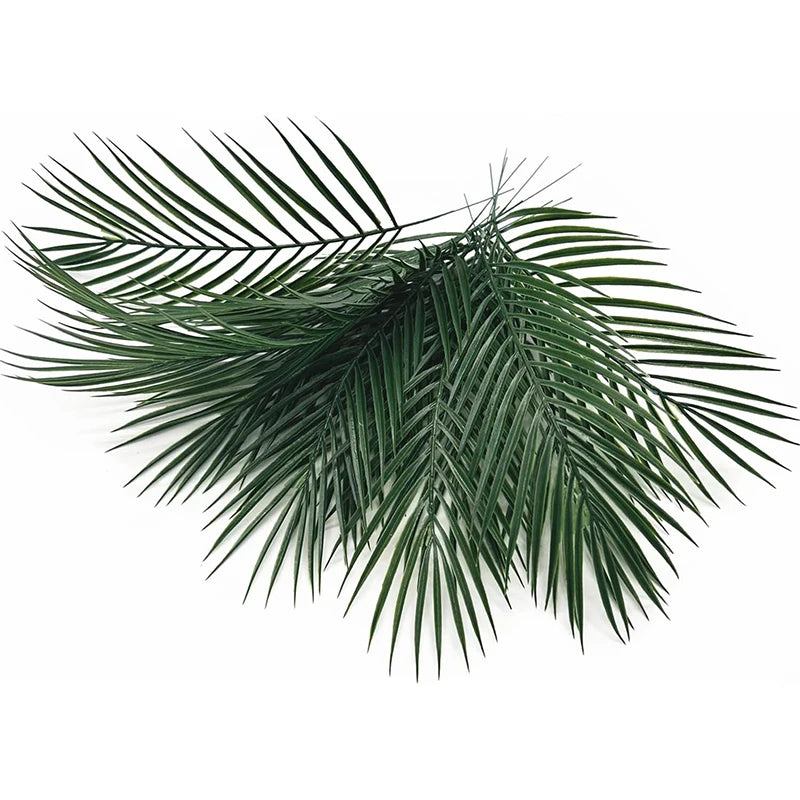 A cluster of artificial tropical palm and monstera leaves in various shades of green.