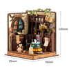 A wooden miniature dollhouse kit featuring detailed furniture, plants, and decorative items built into a puzzle structure.