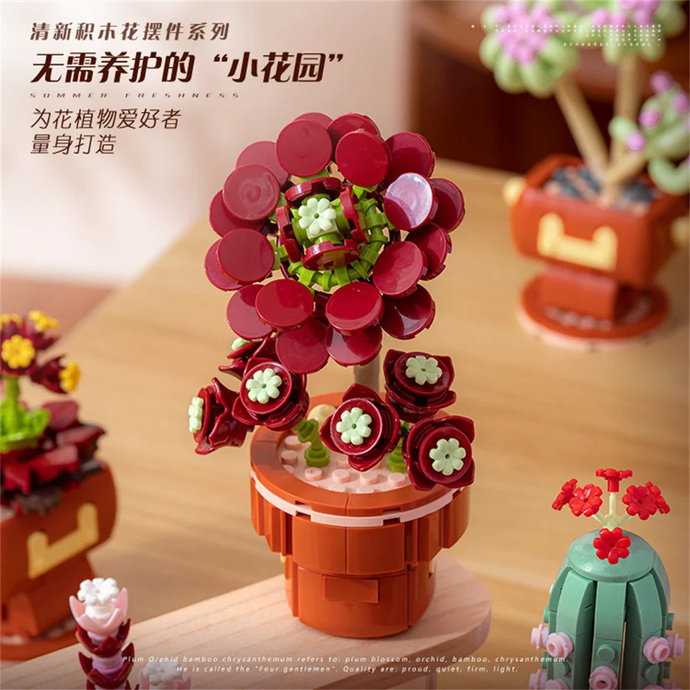 A set of red and green floral building blocks featuring roses and leaves.