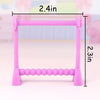 Pink plastic laundry drying rack with hangers, measuring 2.4 inches wide and 2.3 inches high.