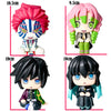 Four Demon Slayer anime action figures featuring characters like Tanjiro and Giyuu in various poses