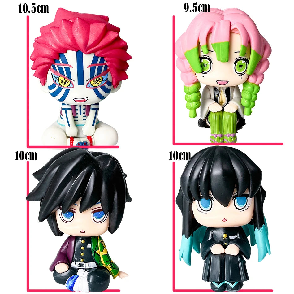 Four Demon Slayer anime action figures featuring characters like Tanjiro and Giyuu in various poses