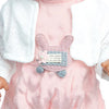 A pink doll outfit set featuring a shirt with a cat print design and white and light pink layered fabric.