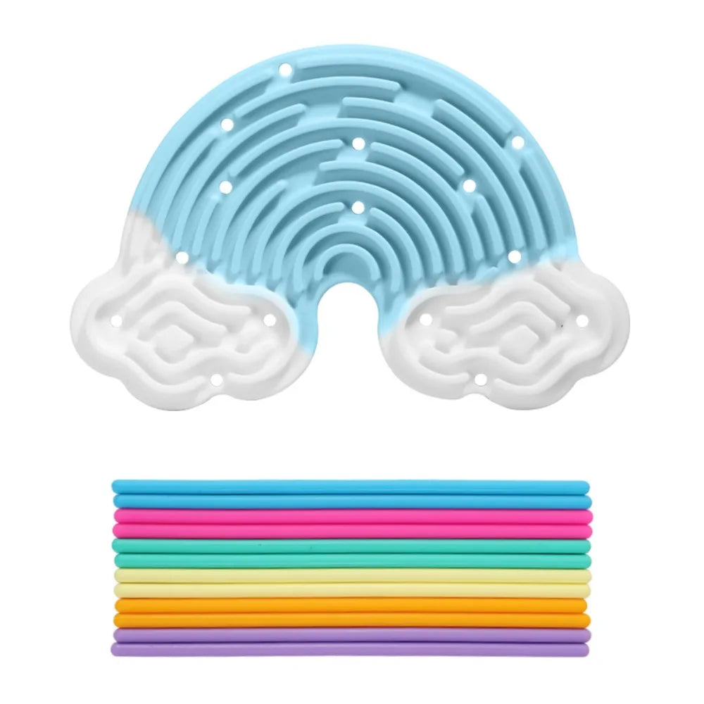 A light blue silicone sensory activity board with a maze pattern and a white silicone board, next to a stack of twelve colore