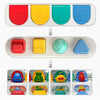 A set of four colored pop-up animal toys for a Montessori cause and effect learning game