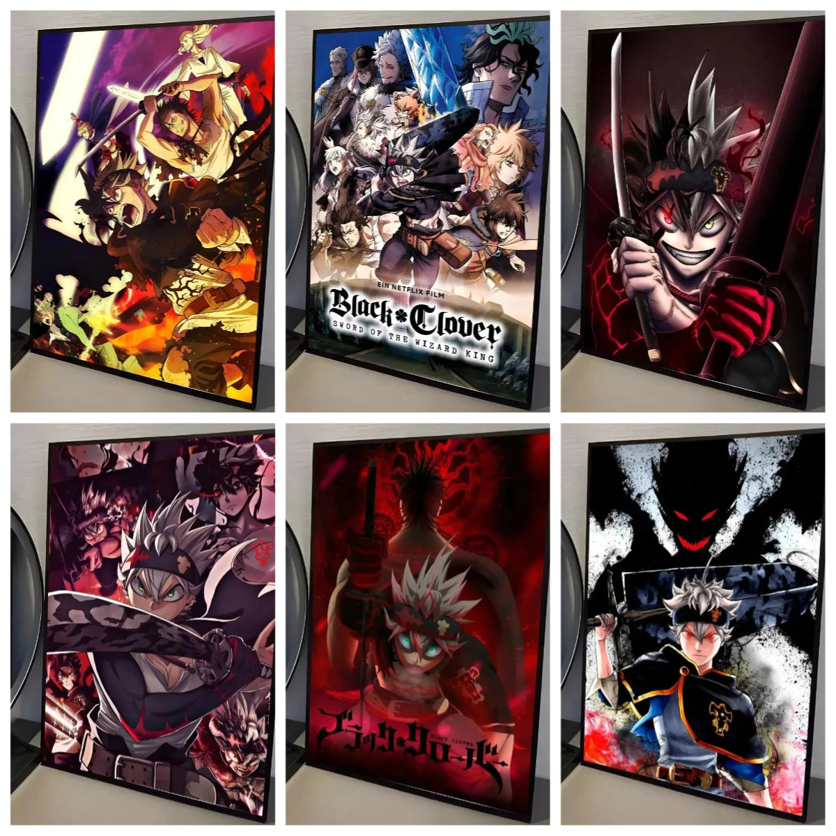 A collection of four framed anime posters featuring characters from Black Clover