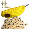 A yellow fabric storage bag shaped like a banana, next to a pile of alphabet letter tiles.