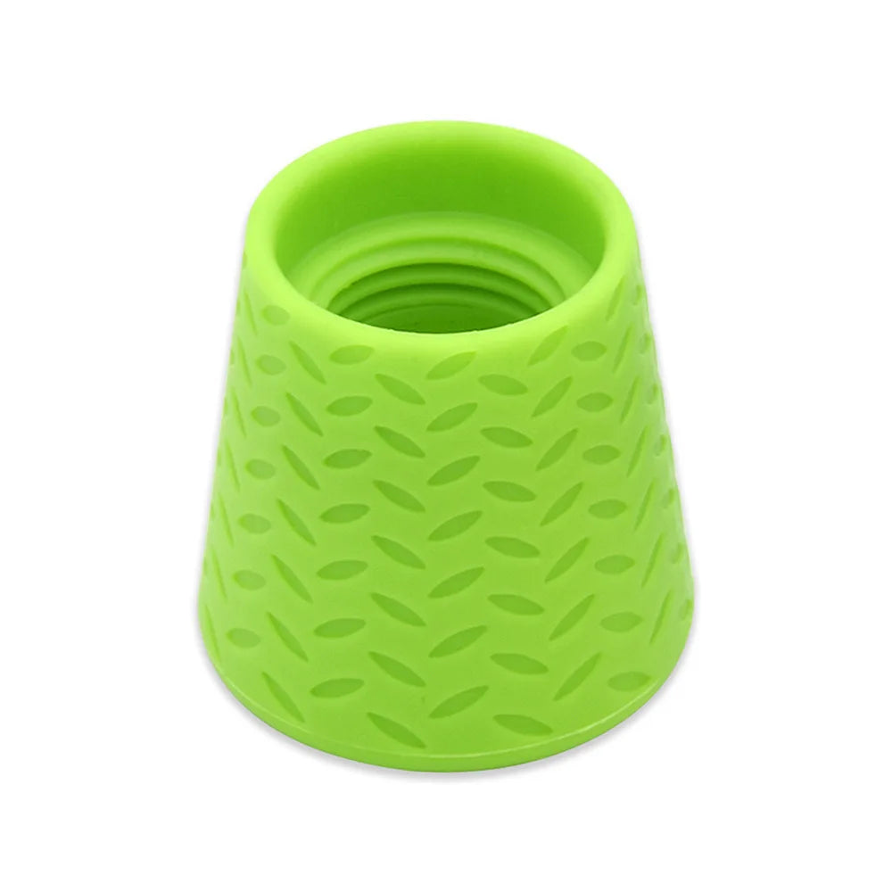 A bright lime green silicone pet shower head with a textured, ridged design.