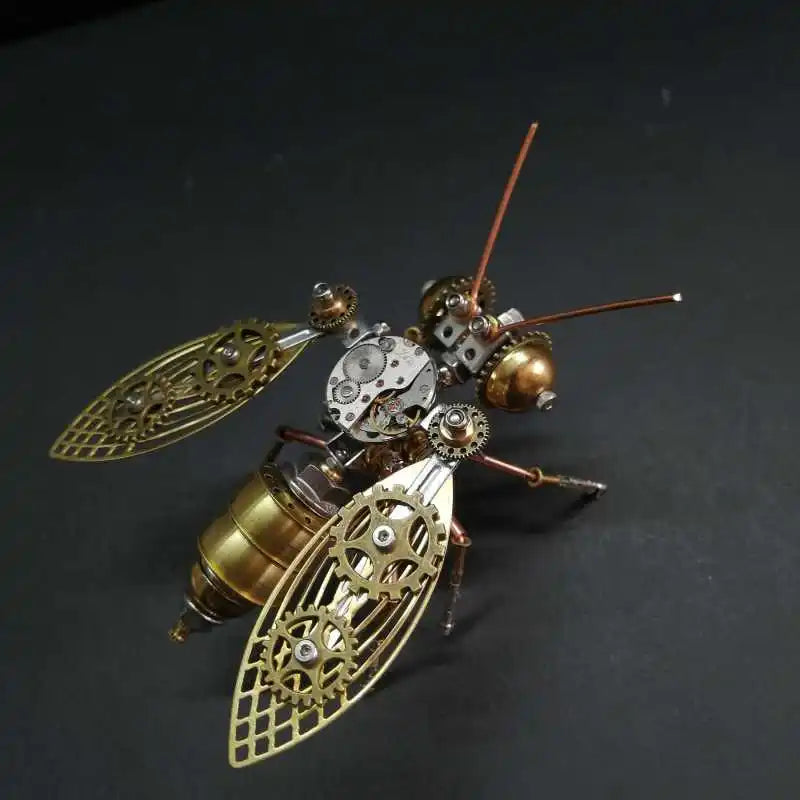 A detailed steampunk mechanical bee model kit featuring intricate metal parts and wings.