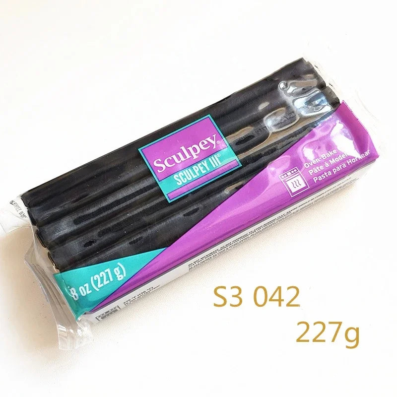 A package of Sculpey III polymer clay, labeled S3 042, for jewelry making.