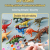 A set of dinosaur figures and various paint colors are displayed for a DIY painting activity.